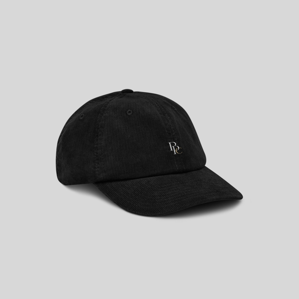 Casquette noire en velours côtelé vue de face, studio