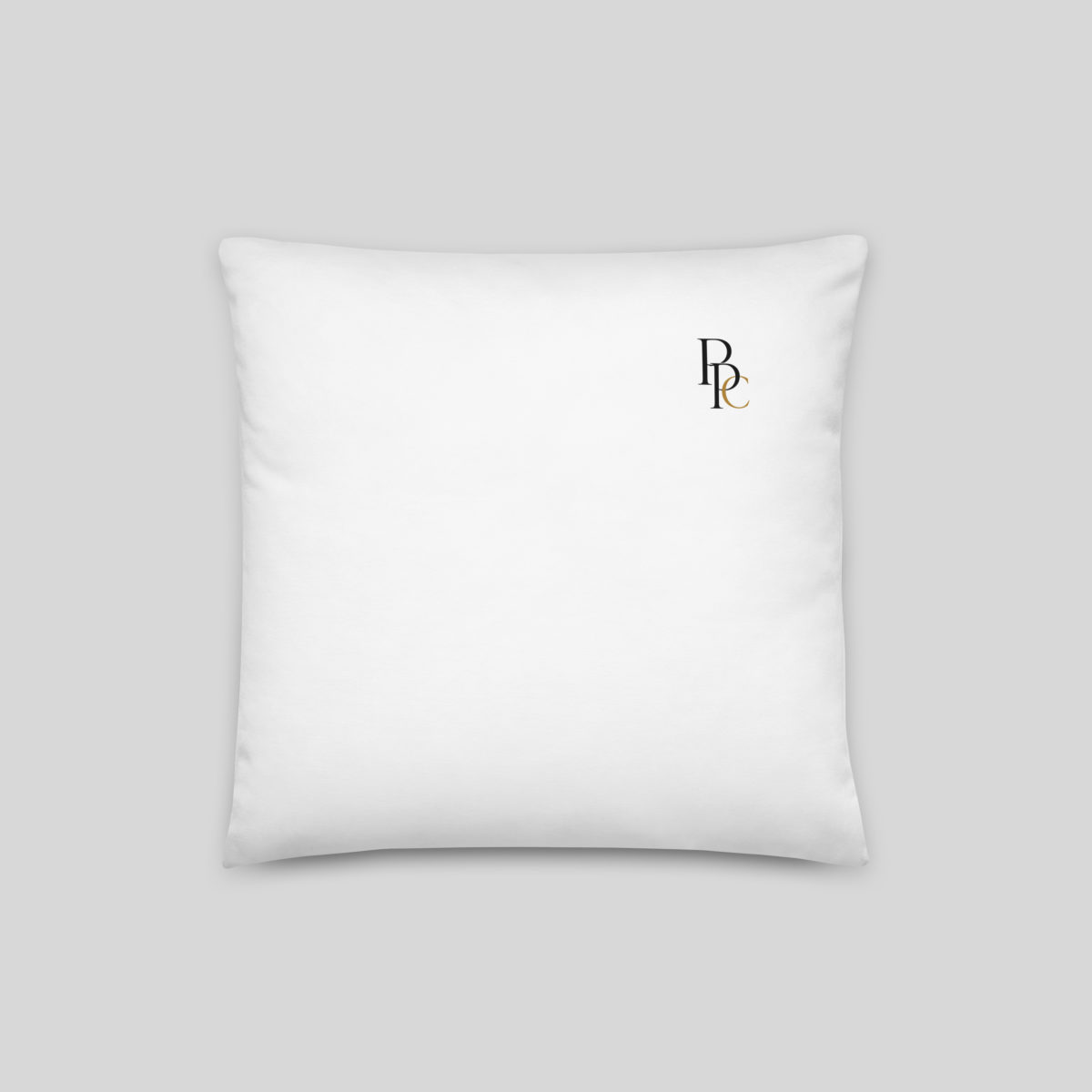 Coussin blanc dans un séjour lumineux, cadeau crémaillère original