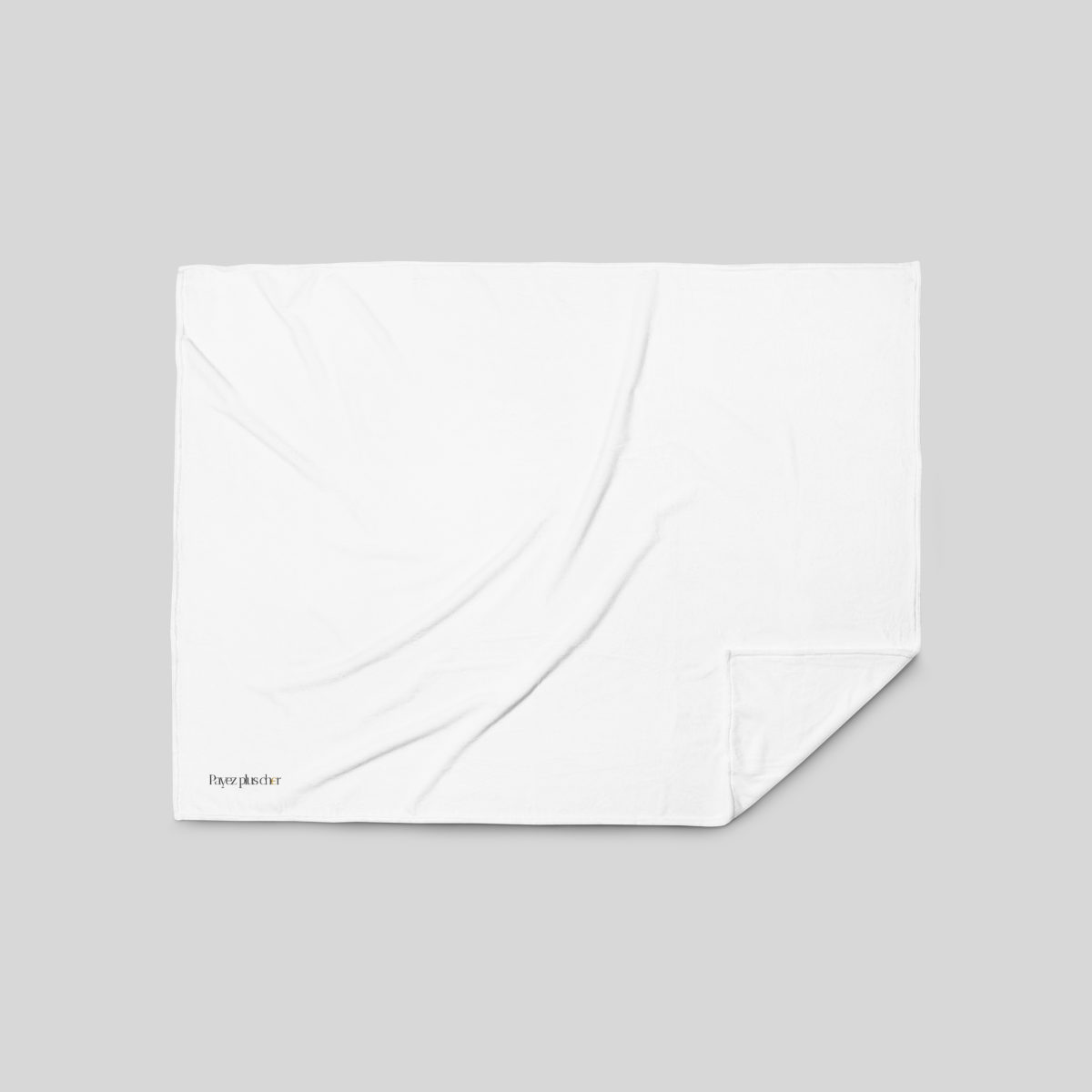 Plaid blanc plié, logo discret dans un angle